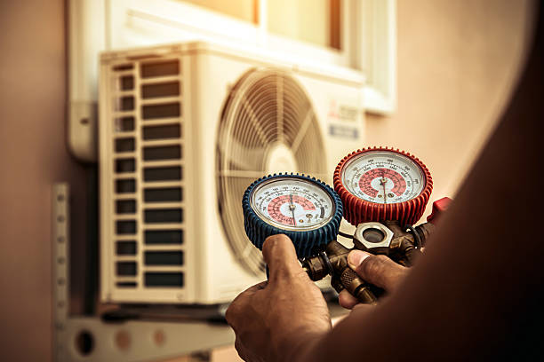 Professional Ductwork Repair technician working in Halls, TN